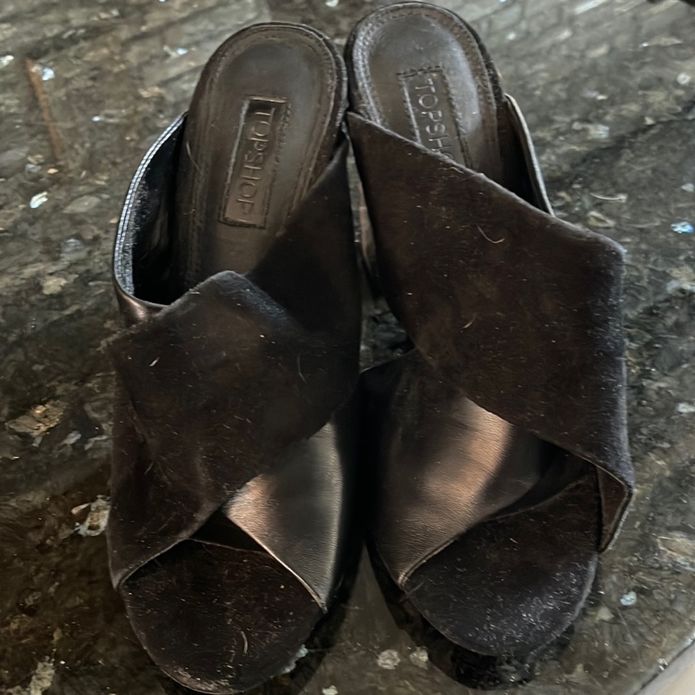 Black sued and leather sandals